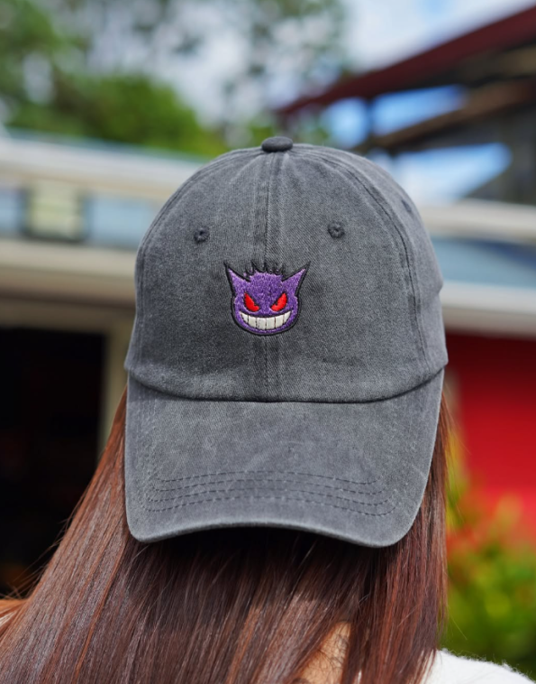 Dad cap with a printed character panel